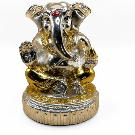 Gold and silver elephant statue on a white background