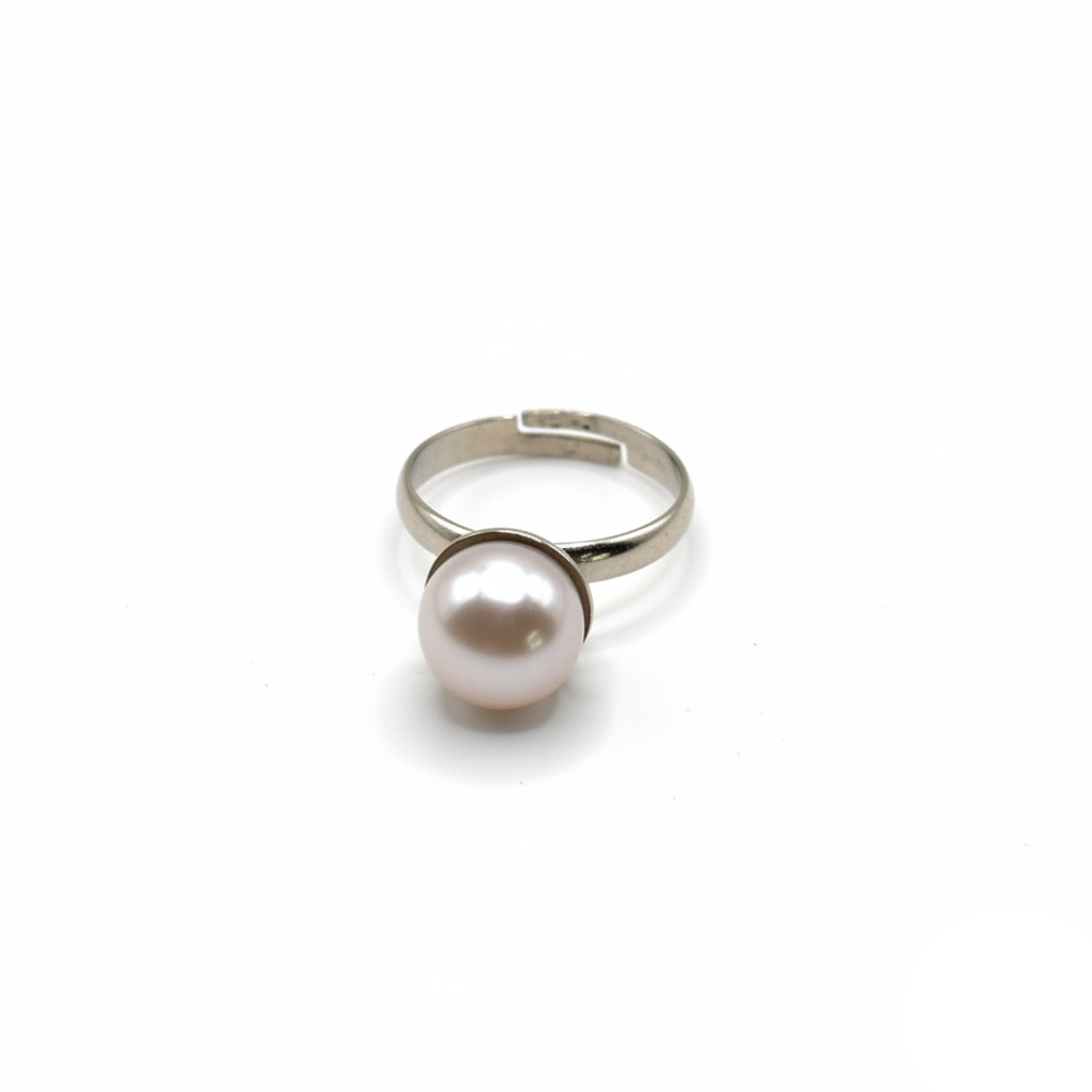 Silver ring with a pearl on a white background