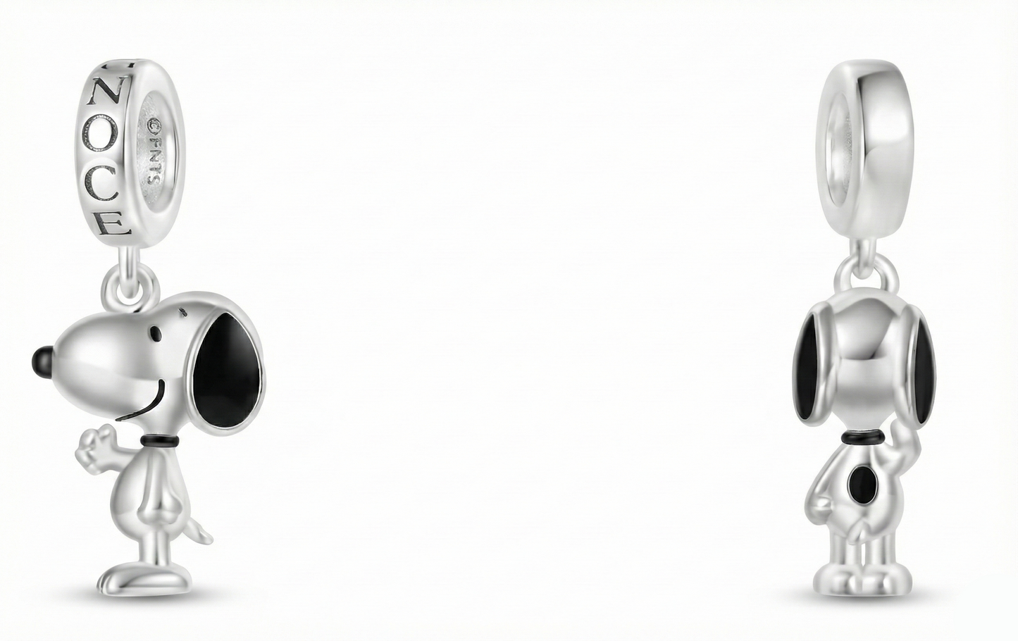 Two silver dog-shaped charms on a white background