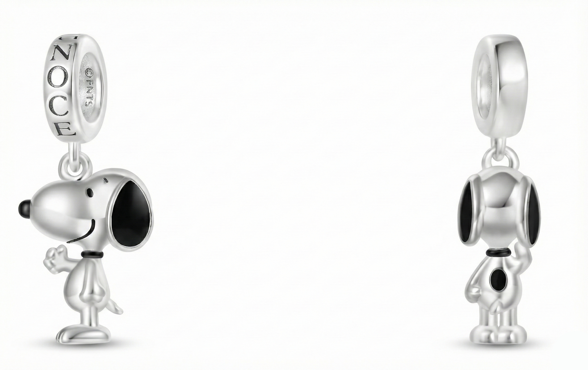 Two silver dog-shaped charms on a white background