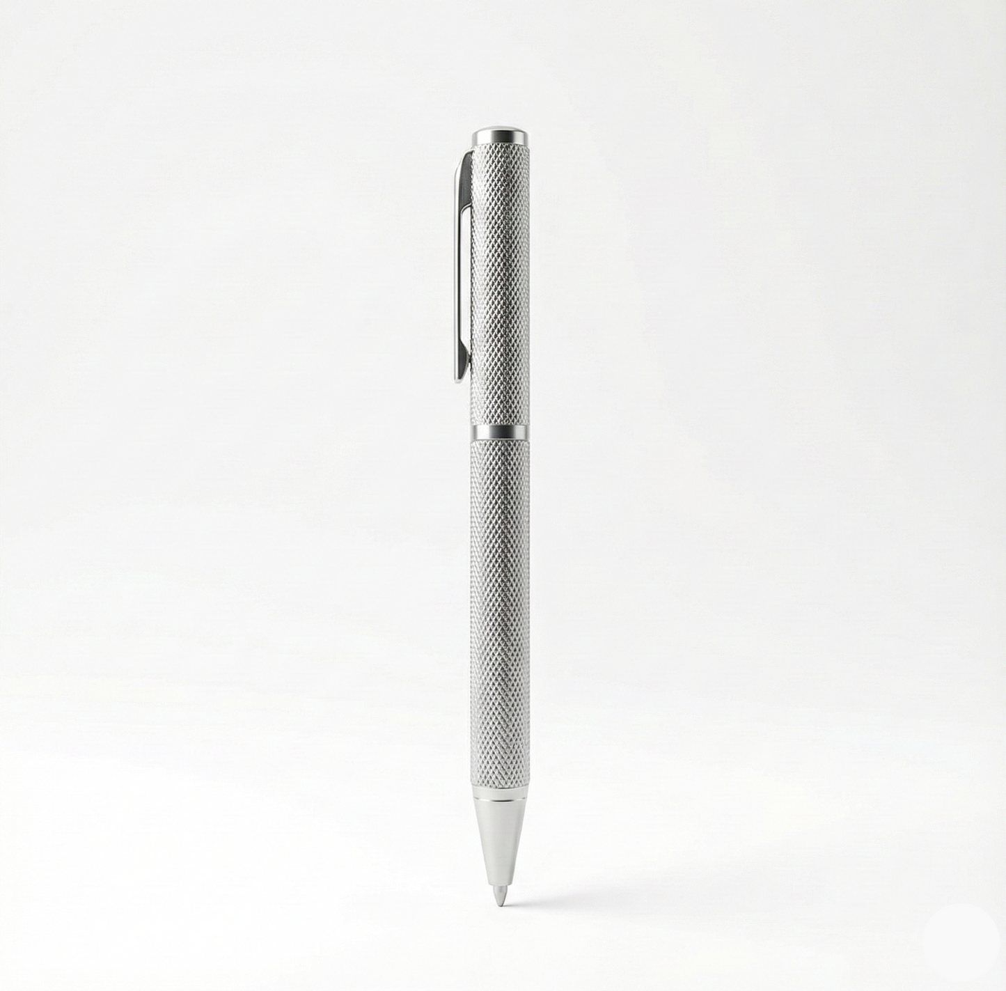 Silver pen on a white background