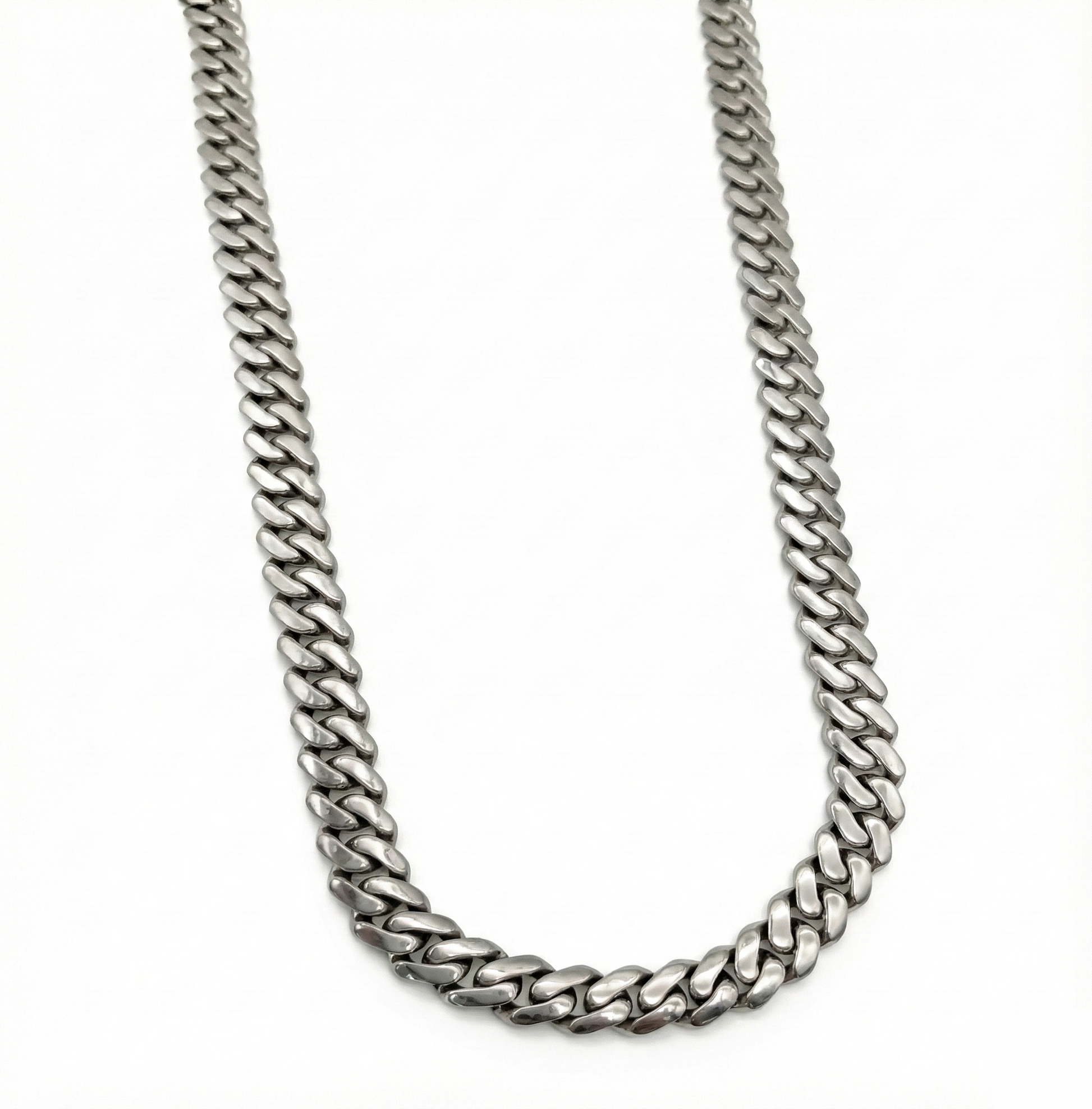 Silver chain necklace on a white background