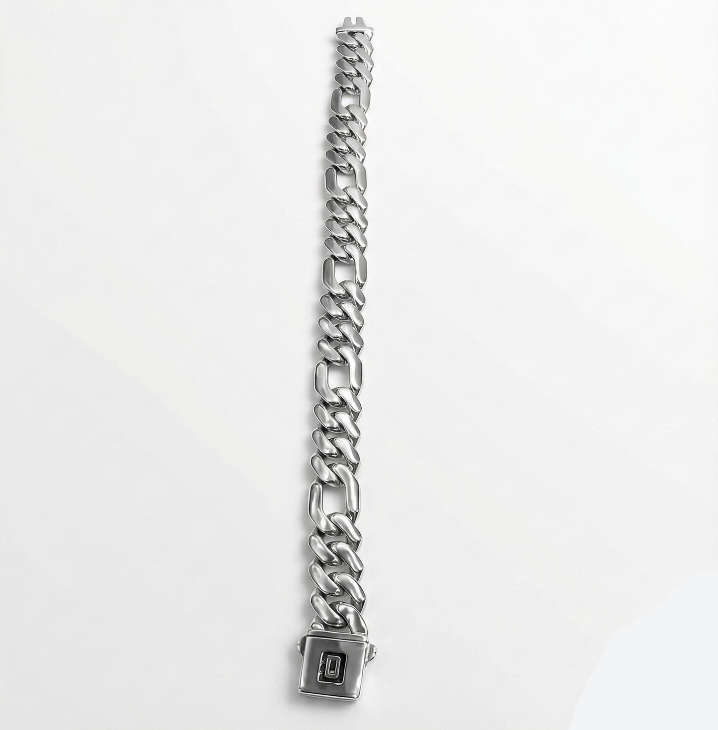 Silver chain bracelet with a clasp on a light gray background