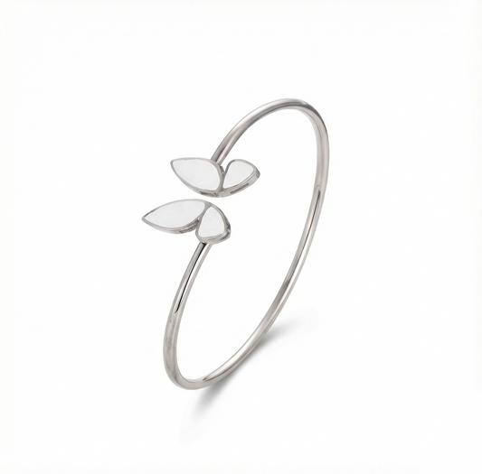 Silver bracelet with leaf-shaped charms on a white background