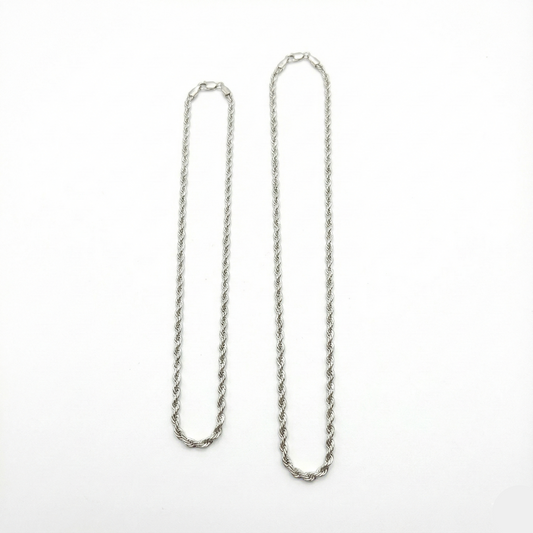 Silver chain necklace on a white background