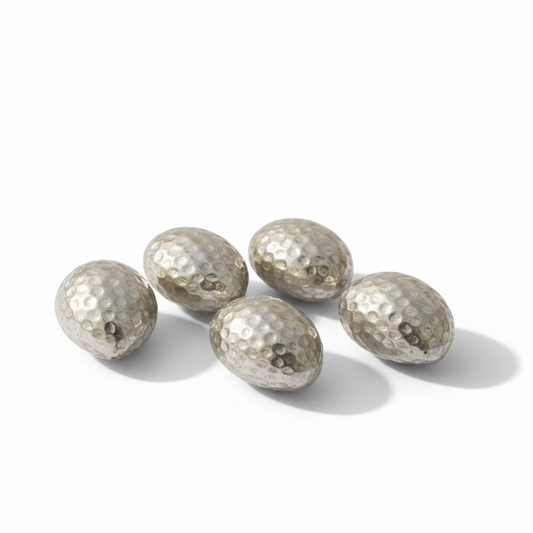 Five metallic golf balls on a white background