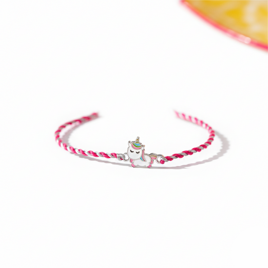 Bracelet with a unicorn charm on a white background