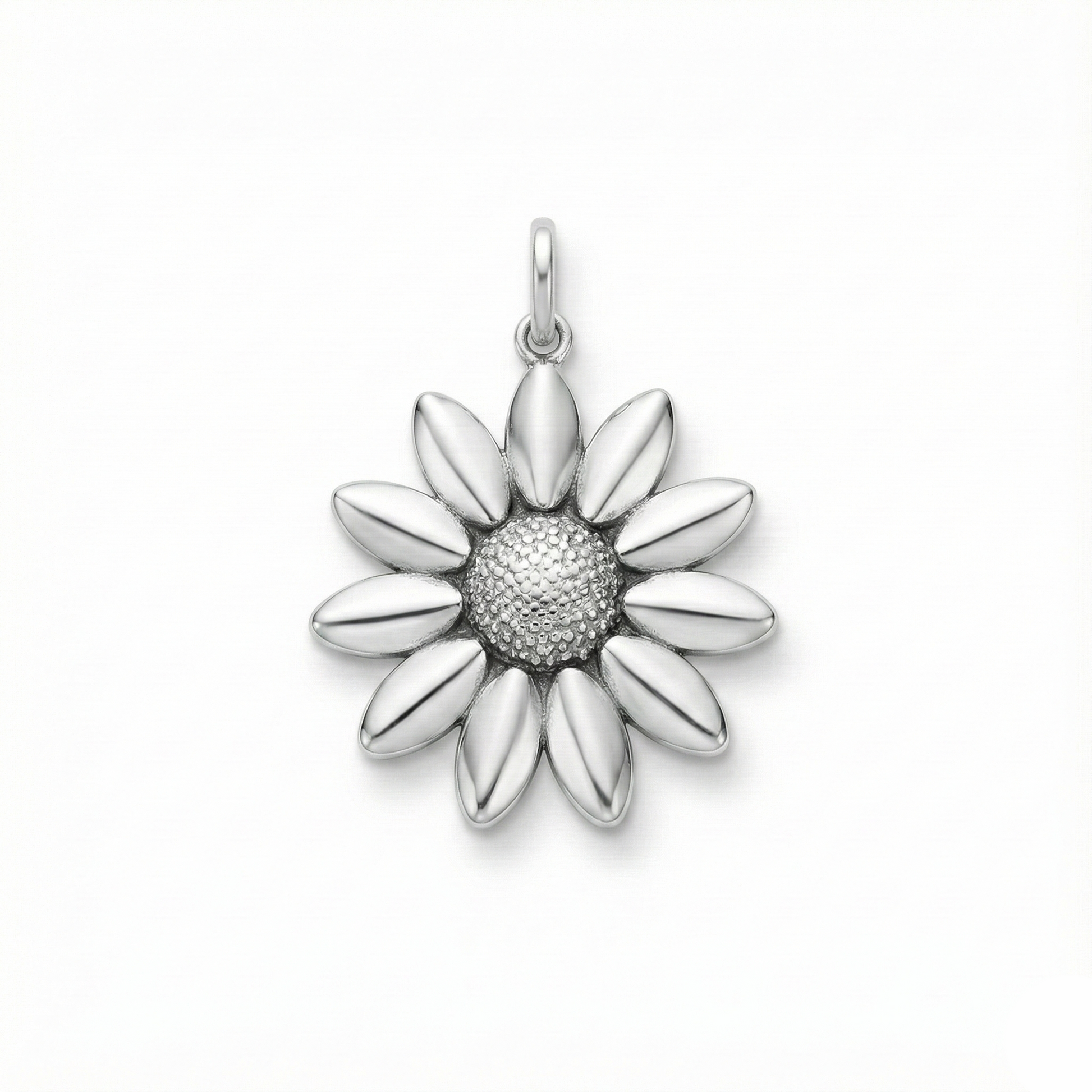 Silver flower-shaped pendant on a white background