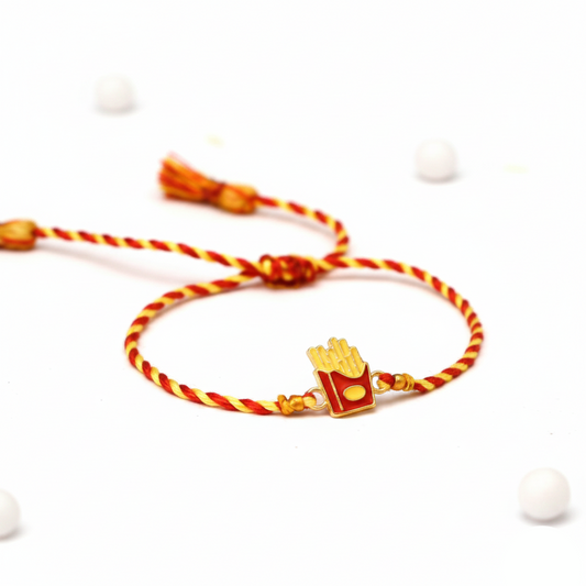 Bracelet with a French fry charm on a white background