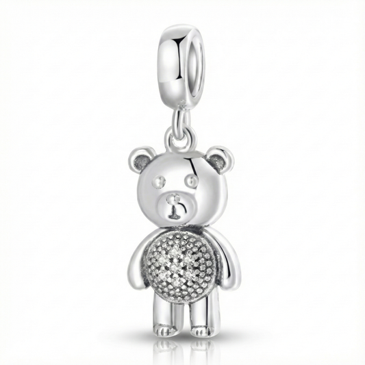 Silver teddy bear charm with clear stones on a white background