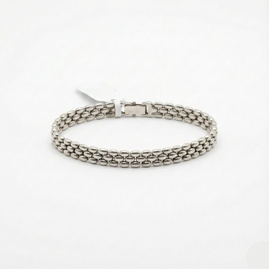 Silver chain bracelet on a white background