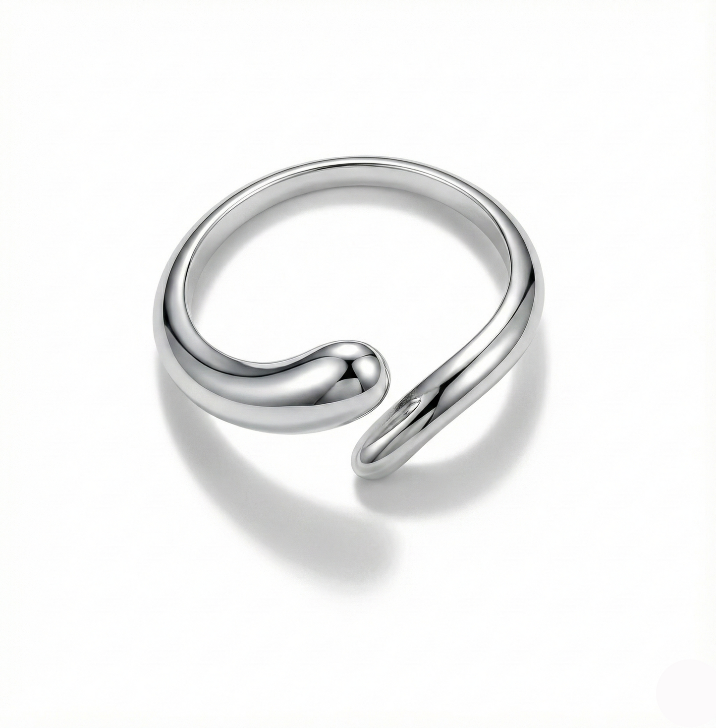 Silver spiral ring on a white background