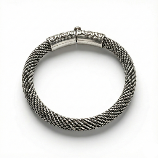 Silver braided bracelet on a white background