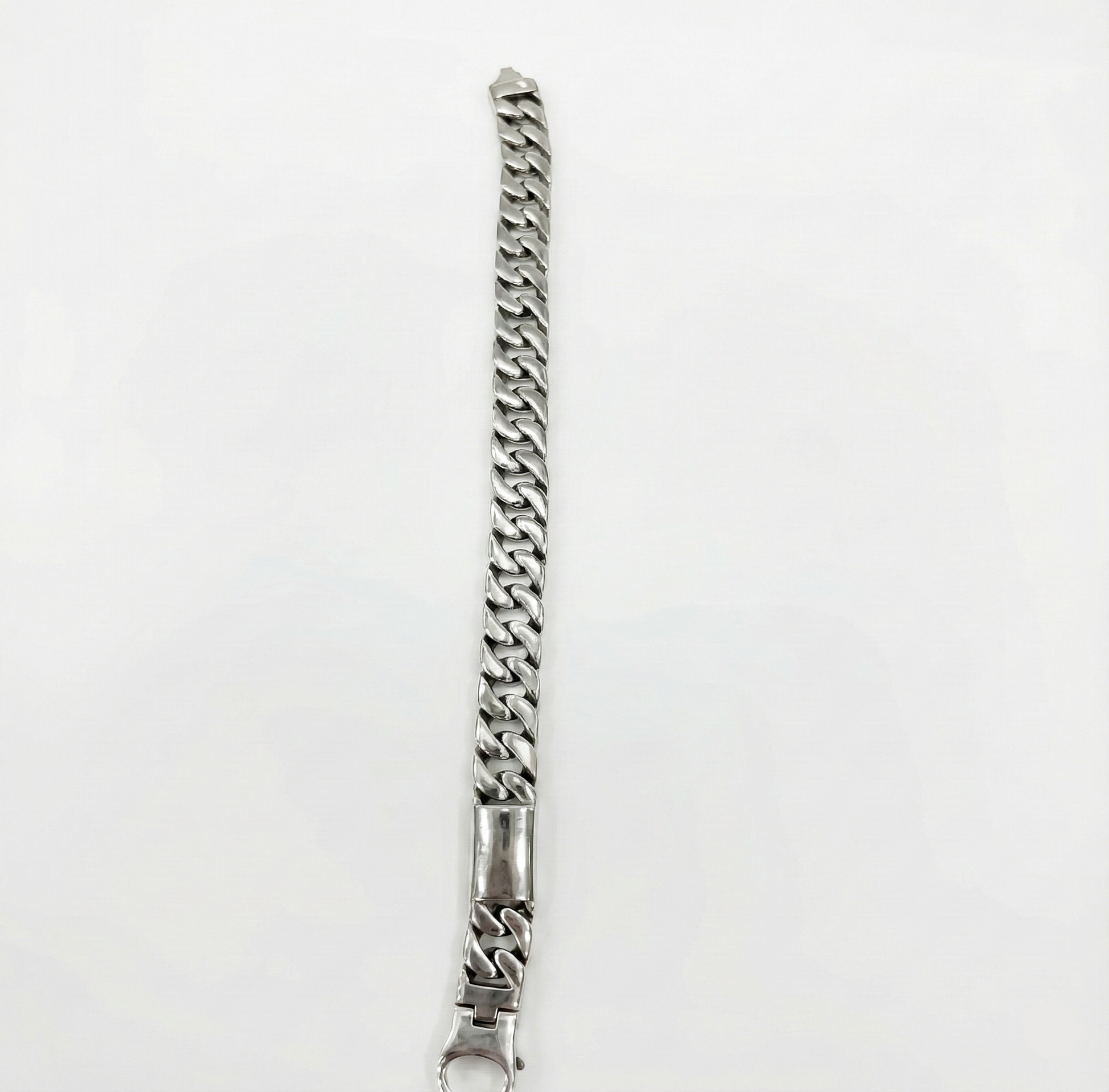 Silver chain bracelet on a white background