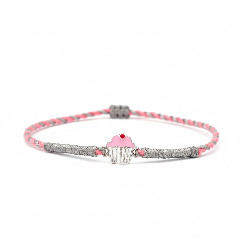 Bracelet with cupcake charm on a white background