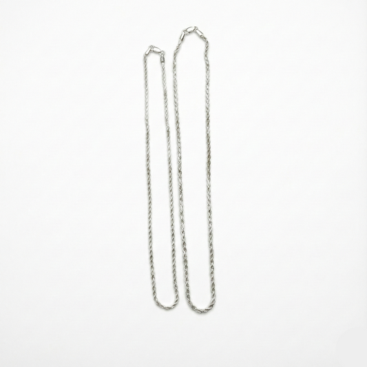 Silver chain necklace on a white background