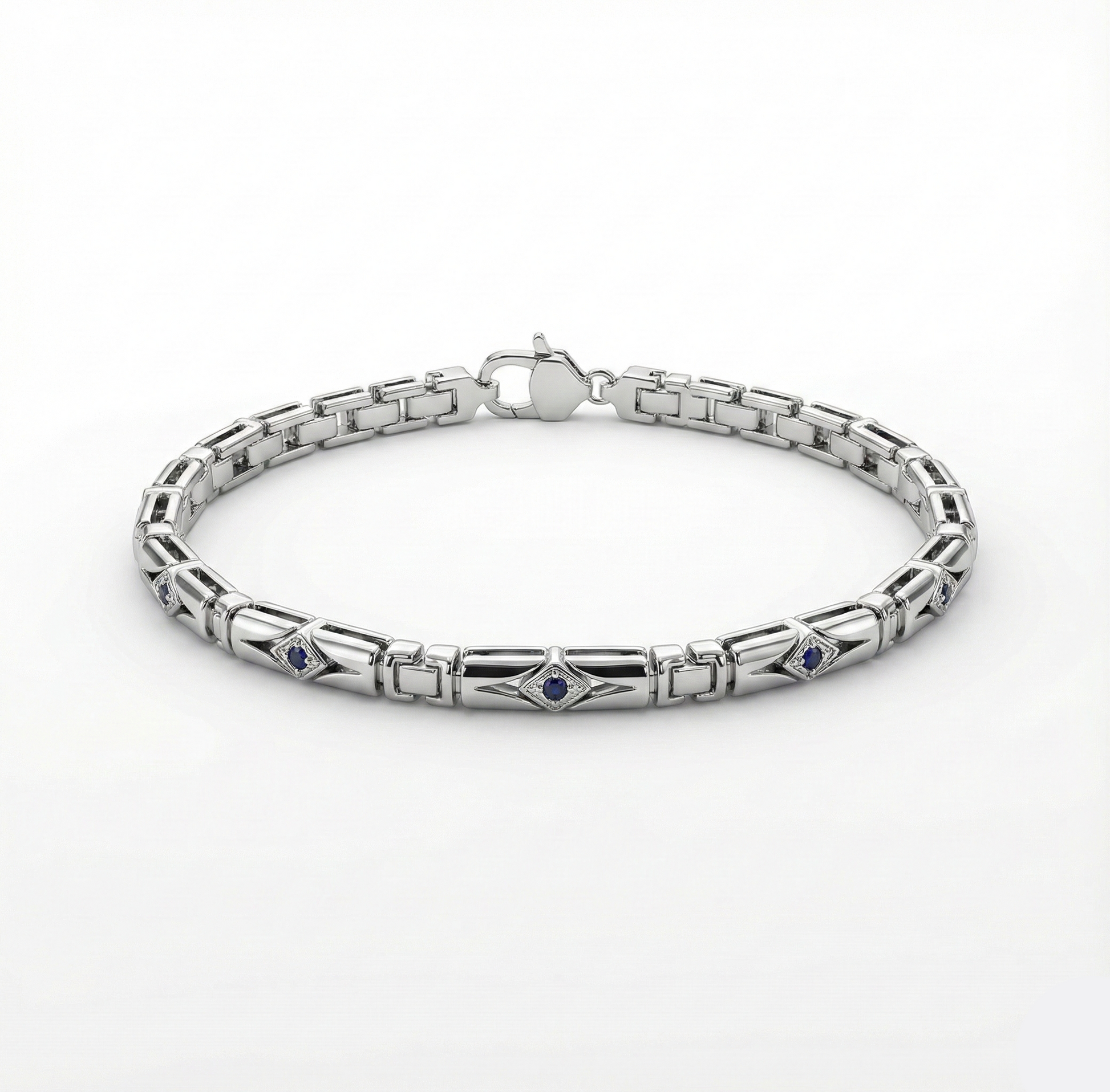 Silver bracelet with embedded stones on a white background