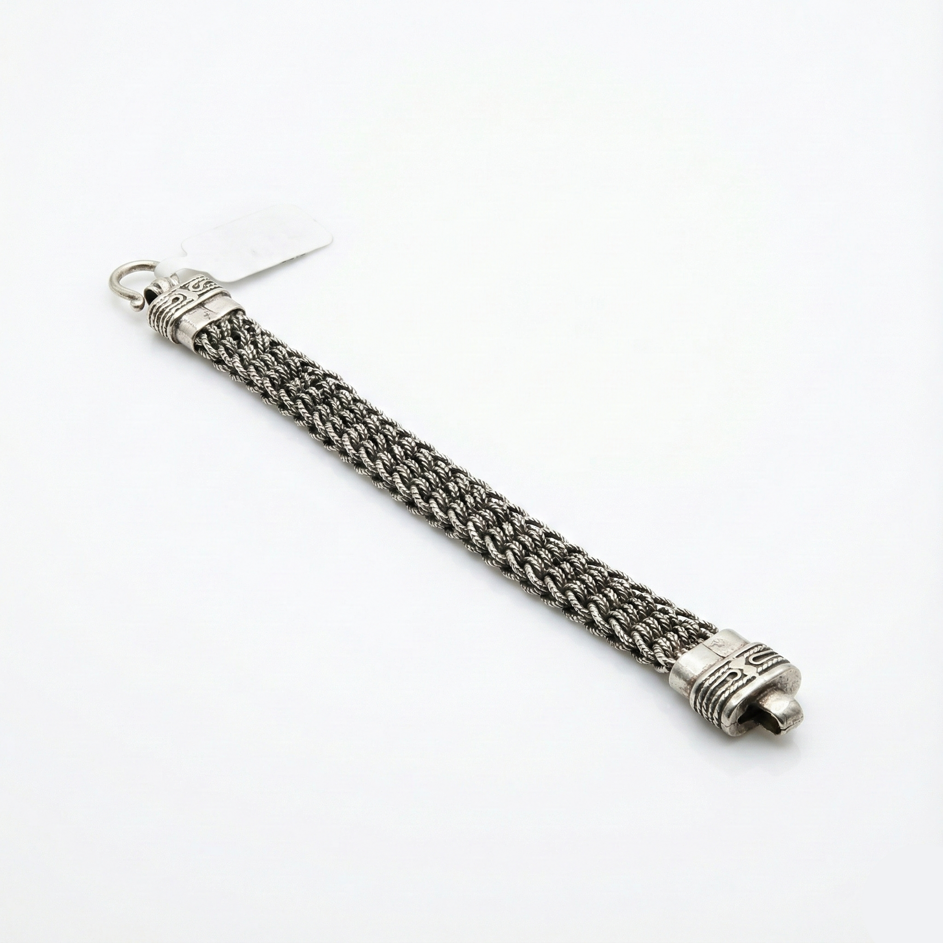 Silver chain tassel on a white background