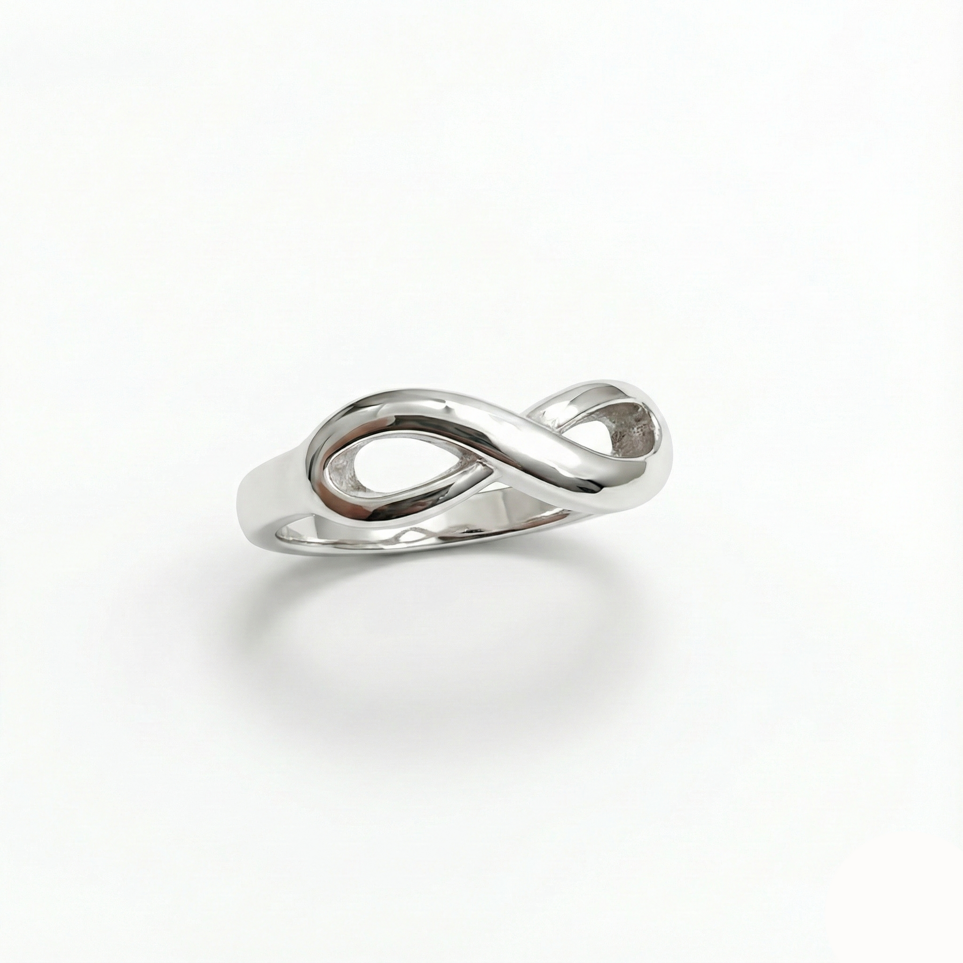Silver infinity ring on a white background
