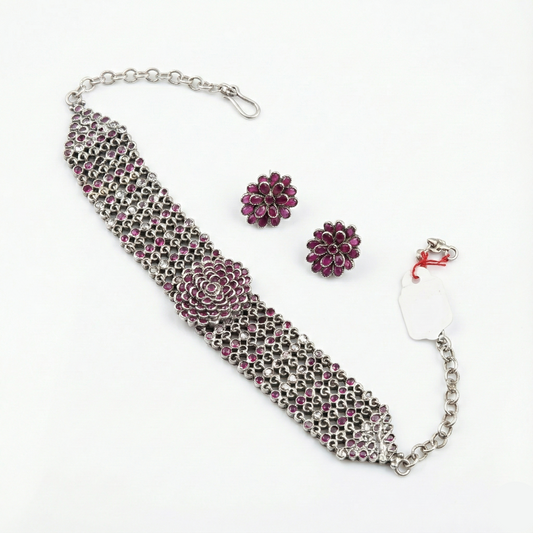 Jewelry set with a bracelet and earrings on a white background