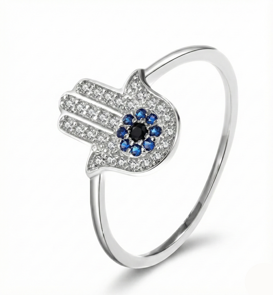 Silver ring with a Hamsa design featuring blue stones on a white background
