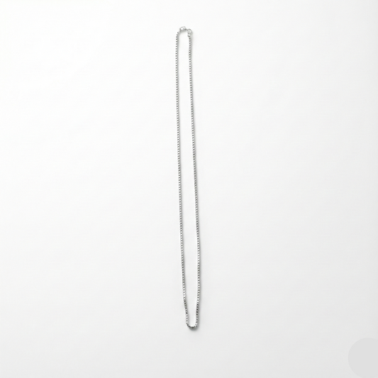 Silver chain necklace on a white background