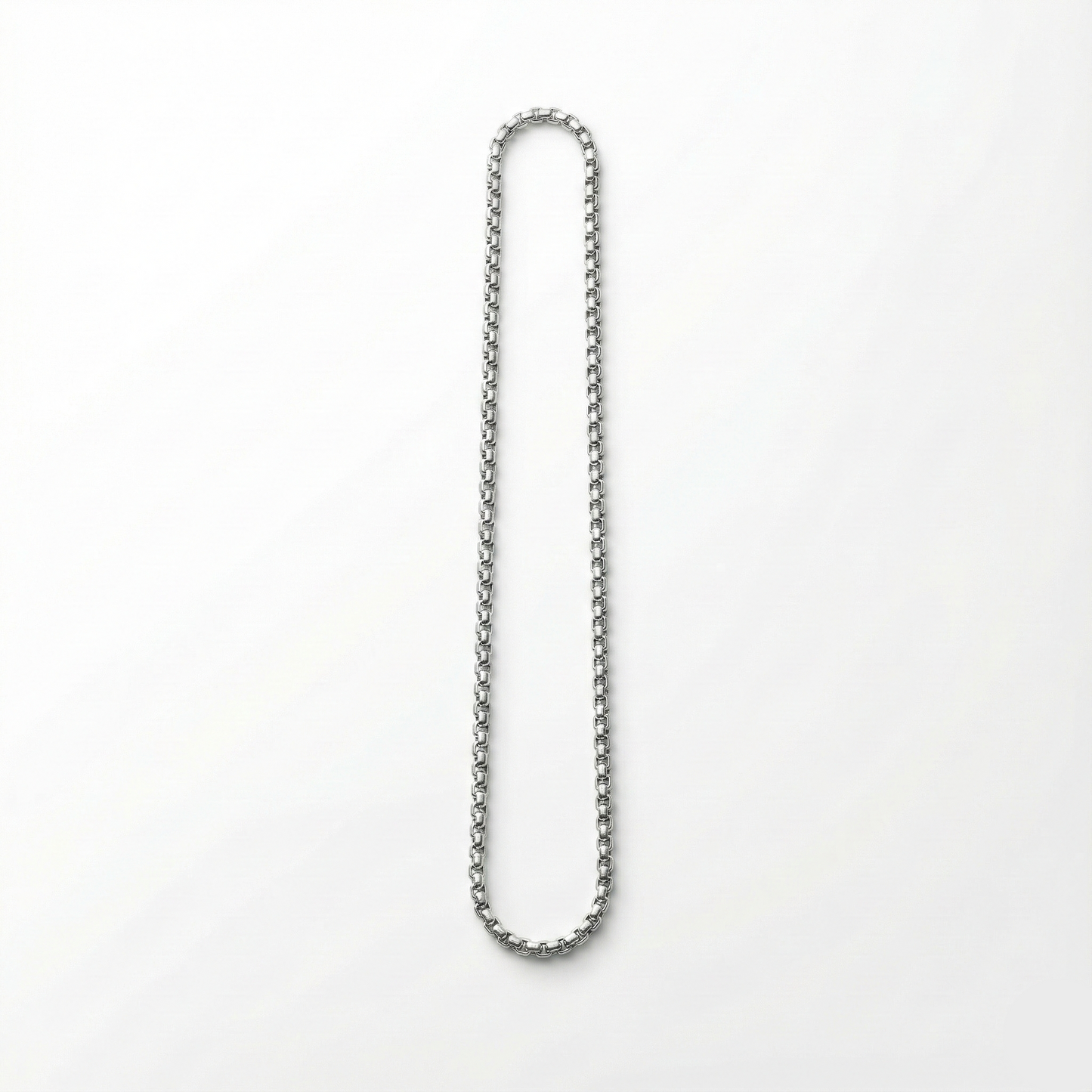 Silver chain necklace on a white background