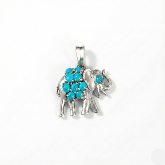 Silver elephant pendant with turquoise stones on a white background