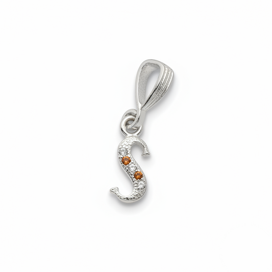 Silver pendant with a letter 'S' and a small orange gemstone on a white background