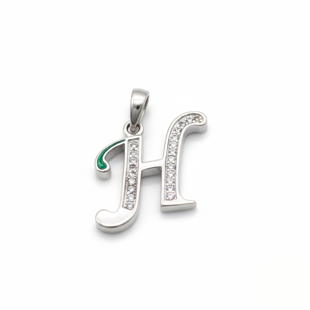 Silver pendant with letter 'H' design on a white background