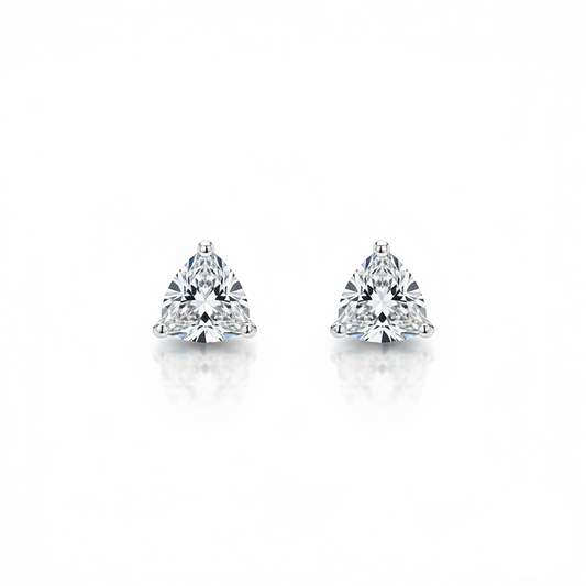 Pair of diamond stud earrings on a white background