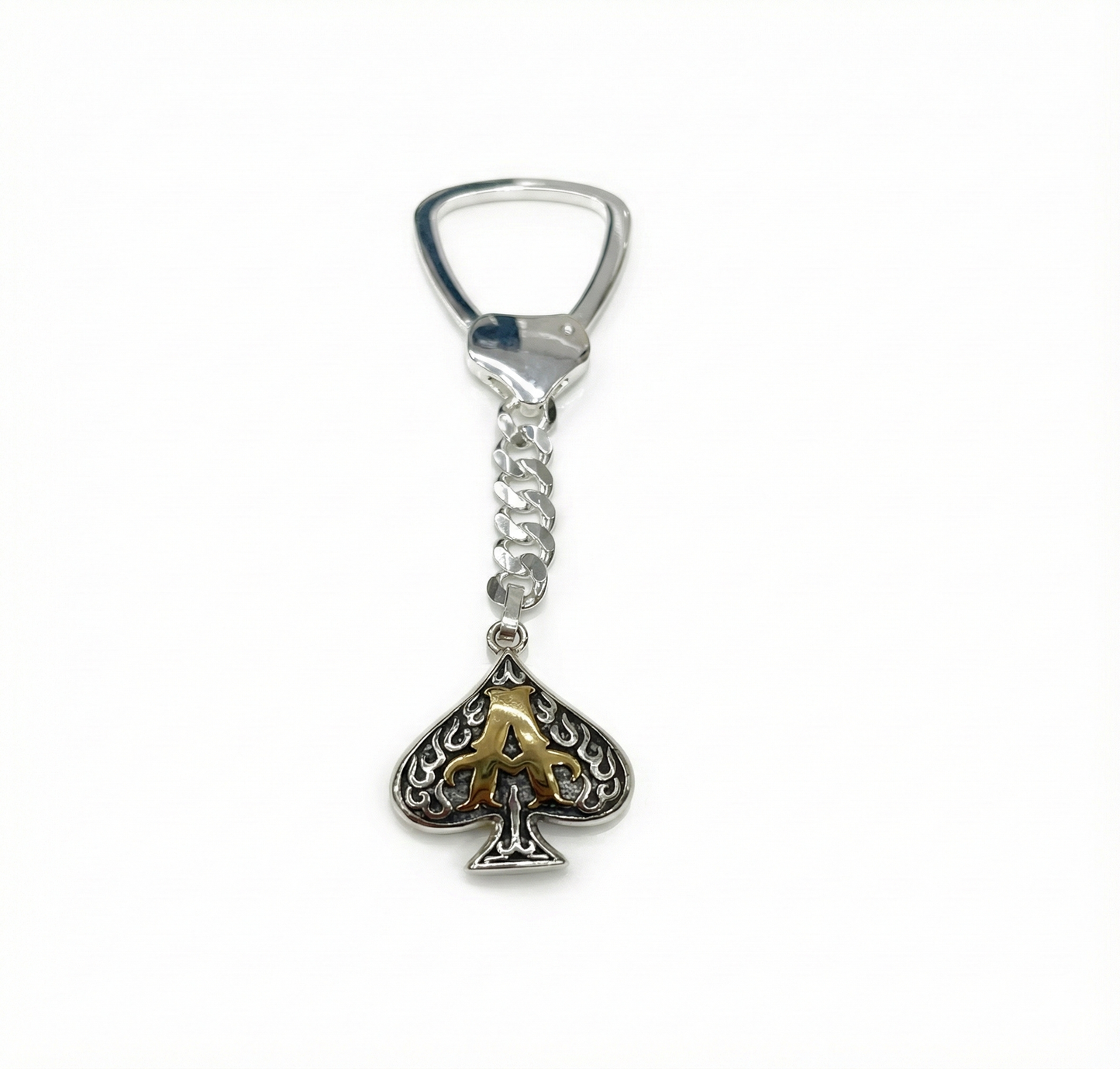 Silver keychain with a spade design on a white background
